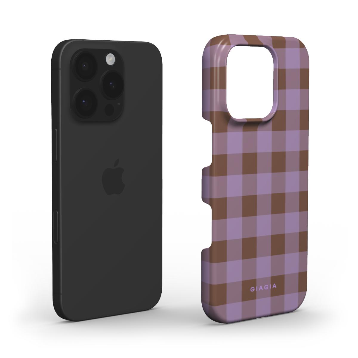 Black phone case next to a plaid patterned phone case on a white background